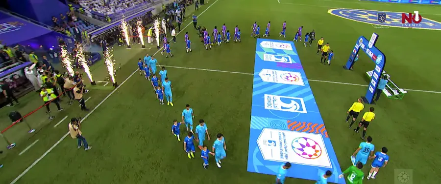 Pyrotechnic jets firing along the players walkout onto the pitch