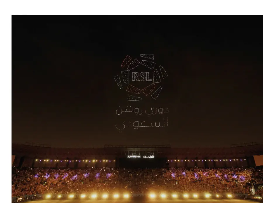 The Roshn Saudi League crest drawn in the night sky by drones above the darkened stadium